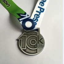 bag hanger and pins and medal 