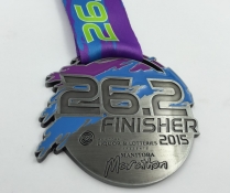 bag hanger and pins and medal 